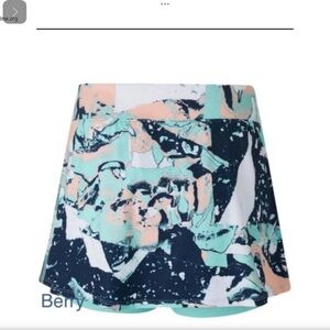 Women’s Size S orange, black, white “Abstractact” tennis skirt.